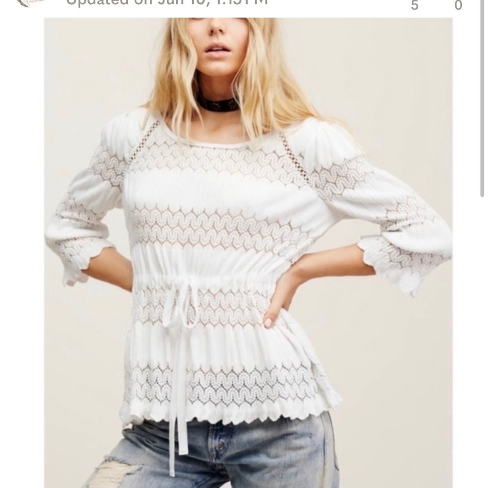 Gorgeous Free People Ivory knit blouse.